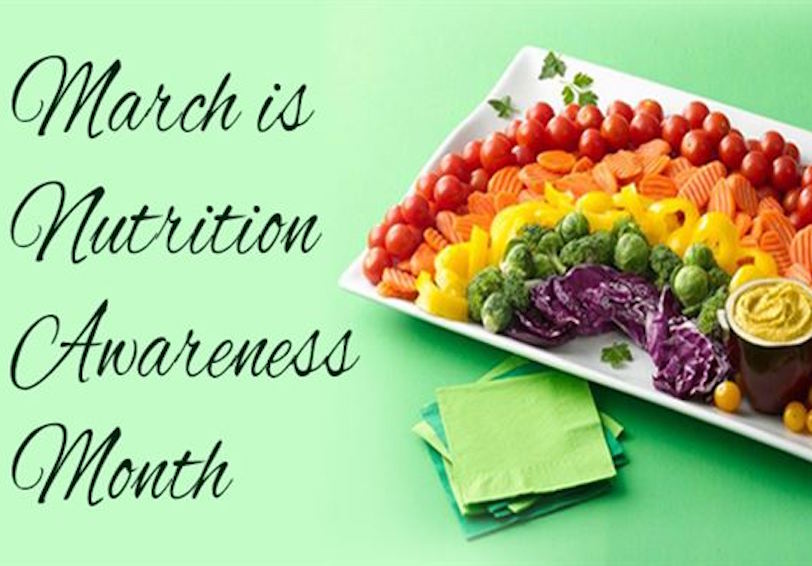 Plate with assorted colorful veggies with words  March is Nutrition Awareness Month  promotes nutrition-fueled performance   