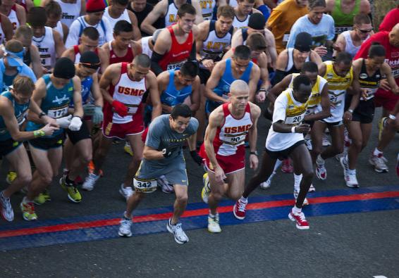 Runners at the starting line of the Annual Marine Corps Marathon after training using a Total Force Fitness approach  U S  Ma