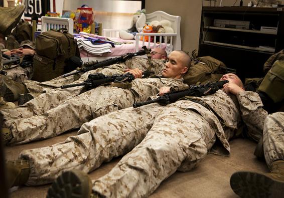Marines and sailors rest in the USO prior to boarding a plane for deployment use HPRC tools to maximize sleep for optimal per