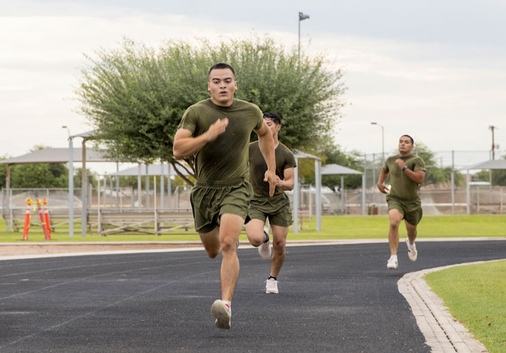 U.S. Marines participate in a squadron wide physical training (PT) event. (U.S. Marine Corps photo by LCpl. Matthew Romonoyske-Bean)