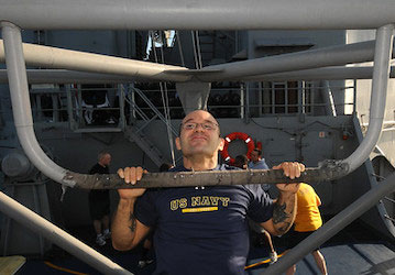 Sailor does pull up to optimize military fitness  U S  Navy photo by Mass Communication Specialist 3rd Class Brian M  Brooks 