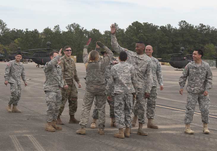 Soldiers give each other high fives