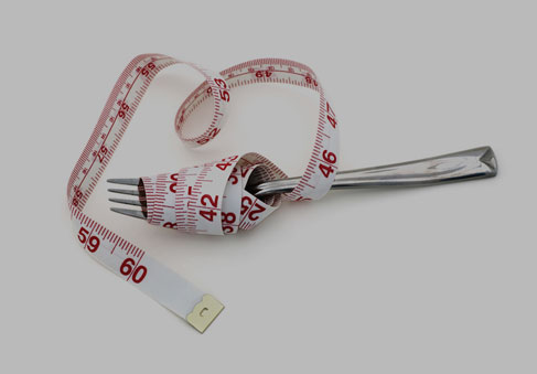 Fork wrapped in measuring tape signals warning signs of disordered eating and highlights HPRC mental health resources that can help. 