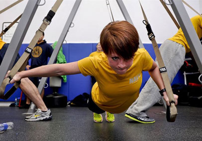 Sailor during military workout practices resilience and fuels Total Force Fitness through military training  DoD photo 