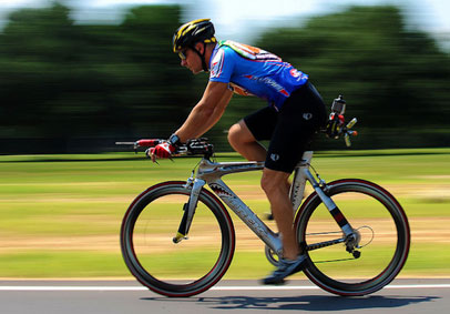 Man cycling as part of physical training to improve military fitness and build resilience  U S  Air Force photo by Airman 1st
