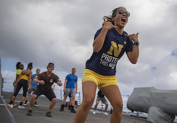 Sailors participate in group fitness to improve military wellness and promote teamwork   U S  Navy photo by Mass Communicatio