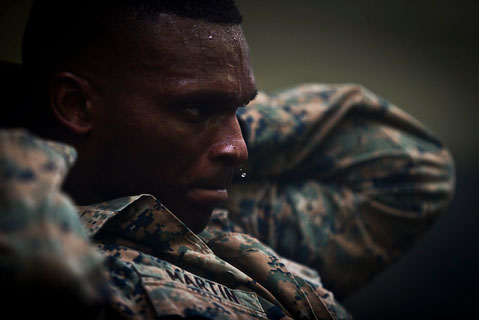 Marine sweats during military workout and practices focusing to manage stress and be resilient   U S  Marine Corps photo by C