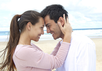 Man and woman hugging and strengthening their relationship with communication  physical touch  and quality time  