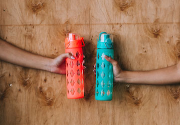 Water bottles for hydration and fueling during military workout