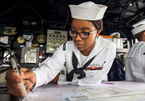 A Sailor plots a course illustrating the importance of mental fitness in total force fitness   U S  Navy photo by Mass Commun