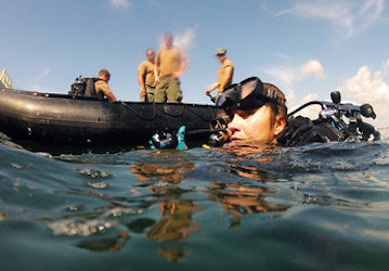 A Seabee prepares to work underwater   U S  Navy photo by Mass Communication Specialist 2nd Class Sean Furey Released 