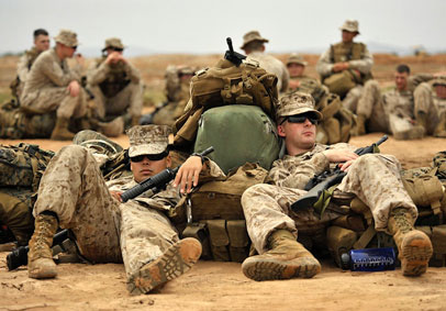 Marines rest prior to military training exercise and practices stress management skills for military wellness   U S  Marine C