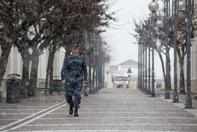 A Sailor walks through snow as a way to increase mental wellness and physical fitness   U S  Navy photo by Mass Communication