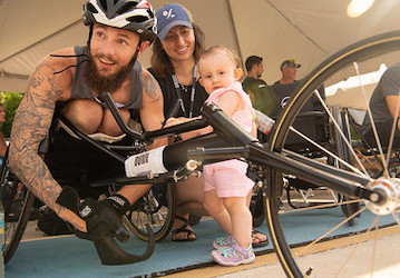 Staff Sgt  Travis Dunn   s family visits him prior to a track race during the 2019 DoD Warrior Games 