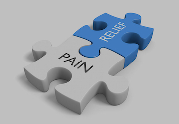 Two puzzle pieces fitted together labeled  Pain  and  Relief  denoting a holistic approach to pain management and total force