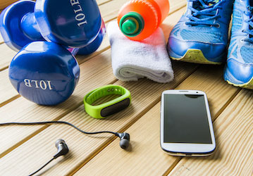 Hand weights  water bottle  hand towel  running shoes  cell phone  fitness tracker  and headphones all of which can be useful