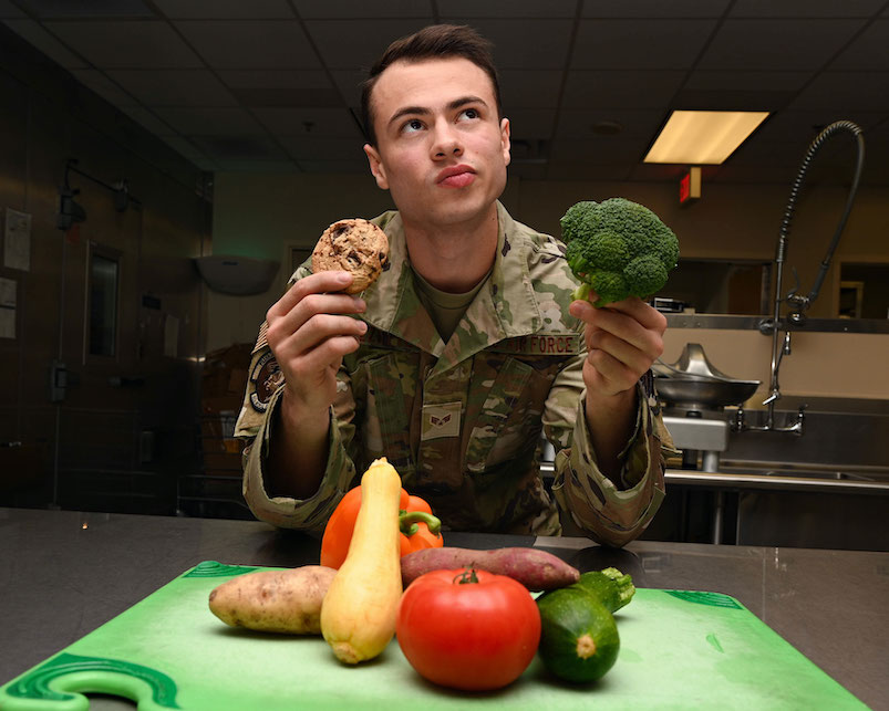 U.S. Air Force Senior Airman Ethan Rizzotte, 633rd Medical Group Nutritional Medicine Clinic diet therapy technician poses for a photo at Joint Base Langley-Eustis, Virginia. (U.S. Air Force photo by Senior Airman Alexandra Singer)