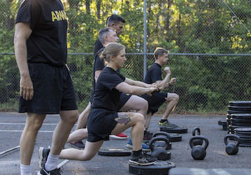 Service Members complete military workout together as part of a holistic wellness strategy. Photo by Staff Sgt. Ashley Morris
