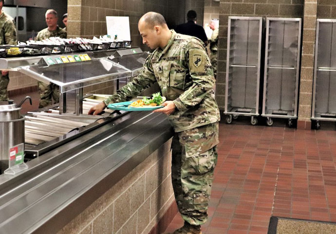 A Soldier gets a meal at a G4G dining facility (U.S. Army Photo by Scott T. Sturkol, Public Affairs Office, Fort McCoy, Wis.)