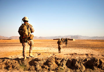 Marines walking across the desert utilize HPRC resources on heat illness recovery and injury prevention  U S  Marine Corps ph