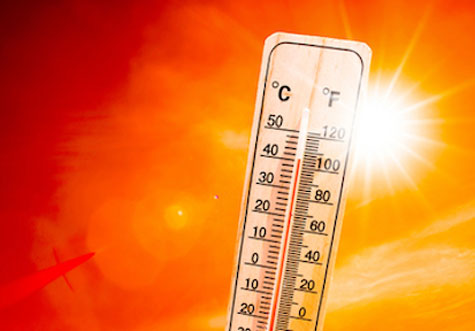 Thermometer and hot sun shows how hot temperatures can affect Service Members during military training