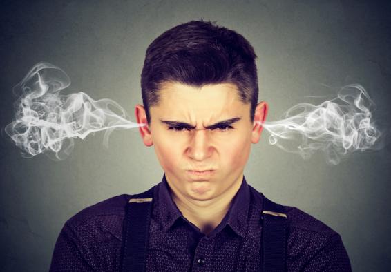 Angry young man with steam coming from his ears showing the importance of healthy relationships in mental health 