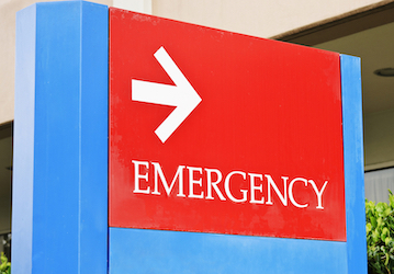Emergency room sign with arrow drawing attention to heat injury prevention strategies to maintain military wellness