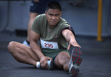 Marine stretching to prevent injury during military training and workouts   U S  Marine Corps photo by Sgt  Elyssa Quesada 