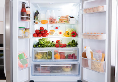 Refrigerator with organized healthy food shows a performance nutrition strategy for fueling your body 