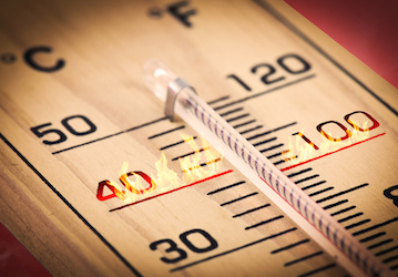 Thermometer with flames shows hot temperatures put Service Members at risk during military workout