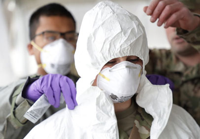 Service Members put on personal protective equipment to maintain mental wellness and optimize performance during pandemic res