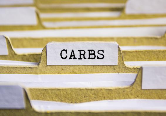 File folder labelled  CARBS  with information to promote nutrient-rich complex carbohydrates for optimal health and performan